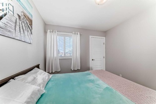1016 Lanark Boulevard Se, Airdrie, AB - Indoor Photo Showing Bedroom