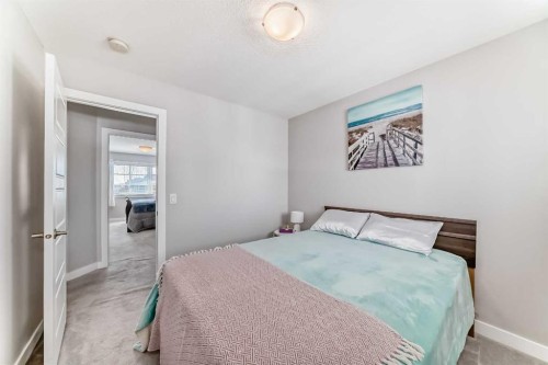 1016 Lanark Boulevard Se, Airdrie, AB - Indoor Photo Showing Bedroom