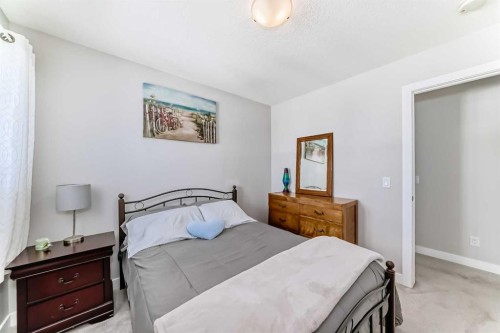 1016 Lanark Boulevard Se, Airdrie, AB - Indoor Photo Showing Bedroom