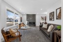 203 Lynnover Place Se, Calgary, AB  - Indoor Photo Showing Living Room With Fireplace 