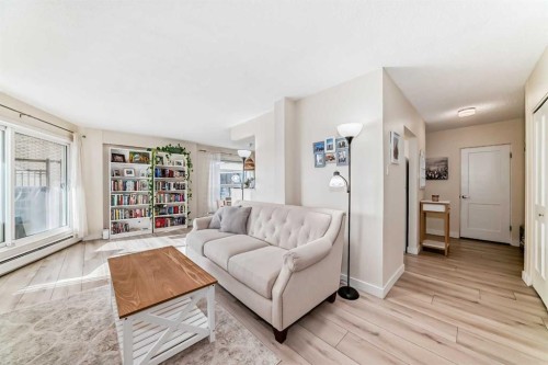 202-520 Cedar Crescent Sw, Calgary, AB - Indoor Photo Showing Living Room
