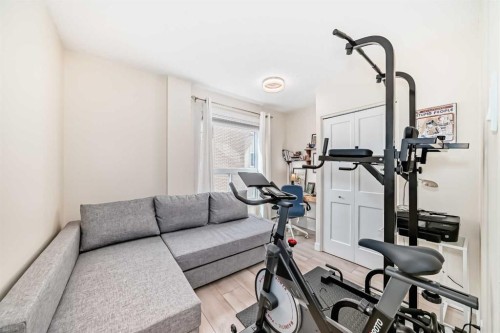 202-520 Cedar Crescent Sw, Calgary, AB - Indoor Photo Showing Gym Room