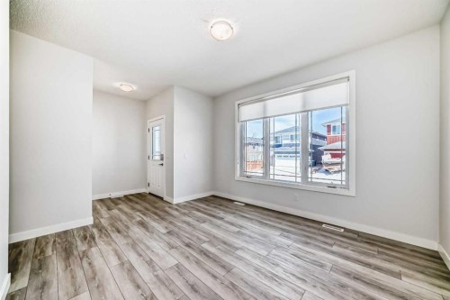 121 Ambleside Heath Nw, Calgary, AB - Indoor Photo Showing Other Room