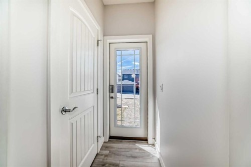 121 Ambleside Heath Nw, Calgary, AB - Indoor Photo Showing Other Room
