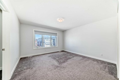 121 Ambleside Heath Nw, Calgary, AB - Indoor Photo Showing Other Room