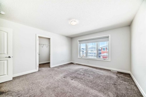 121 Ambleside Heath Nw, Calgary, AB - Indoor Photo Showing Other Room
