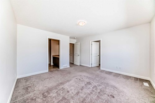 121 Ambleside Heath Nw, Calgary, AB - Indoor Photo Showing Other Room