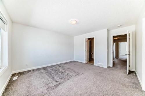 121 Ambleside Heath Nw, Calgary, AB - Indoor Photo Showing Other Room