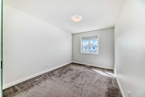 121 Ambleside Heath Nw, Calgary, AB - Indoor Photo Showing Other Room