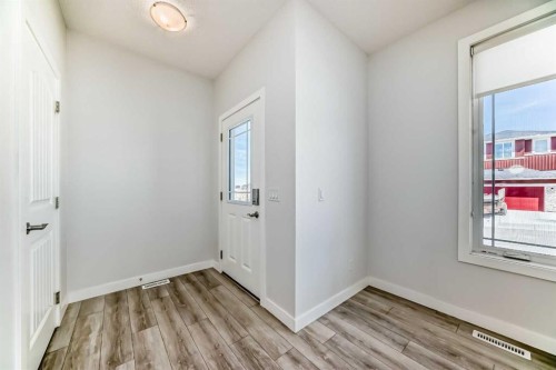 121 Ambleside Heath Nw, Calgary, AB - Indoor Photo Showing Other Room