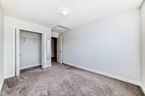 121 Ambleside Heath Nw, Calgary, AB - Indoor Photo Showing Other Room