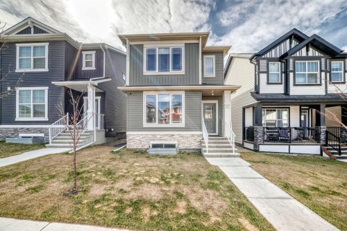 121 Ambleside Heath Nw, Calgary, AB - Outdoor With Facade
