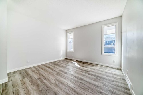 121 Ambleside Heath Nw, Calgary, AB - Indoor Photo Showing Other Room