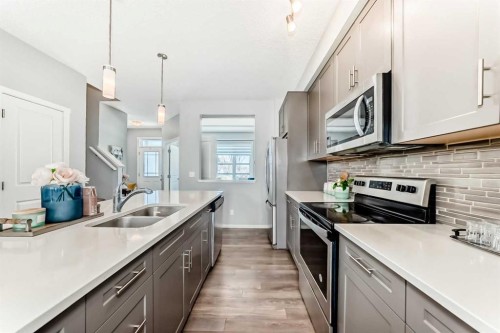 462 Walgrove Way Se, Calgary, AB - Indoor Photo Showing Kitchen With Stainless Steel Kitchen With Double Sink With Upgraded Kitchen