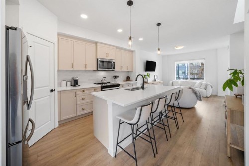 21 Sage Hill Path Nw, Calgary, AB - Indoor Photo Showing Kitchen With Double Sink With Upgraded Kitchen
