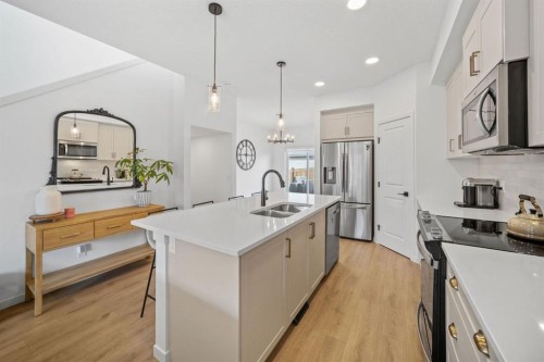 21 Sage Hill Path Nw, Calgary, AB - Indoor Photo Showing Kitchen With Double Sink With Upgraded Kitchen