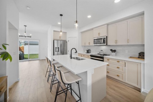 21 Sage Hill Path Nw, Calgary, AB - Indoor Photo Showing Kitchen With Double Sink With Upgraded Kitchen