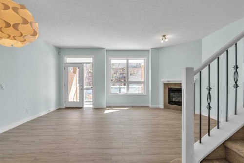 34 Royal Manor Nw, Calgary, AB - Indoor With Fireplace