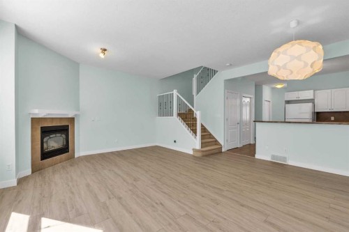34 Royal Manor Nw, Calgary, AB - Indoor With Fireplace