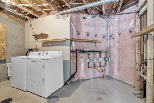 34 Royal Manor Nw, Calgary, AB - Indoor Photo Showing Laundry Room