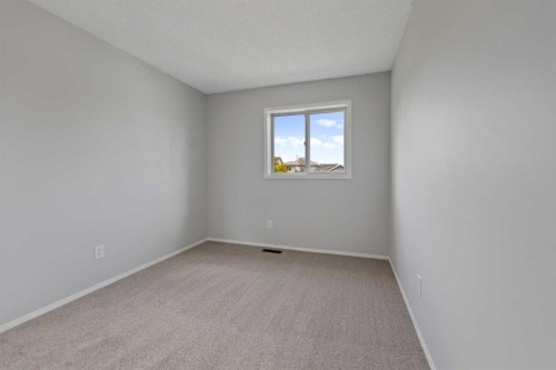 42 River Rock Road Se, Calgary, AB - Indoor Photo Showing Other Room