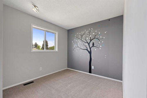 42 River Rock Road Se, Calgary, AB - Indoor Photo Showing Other Room