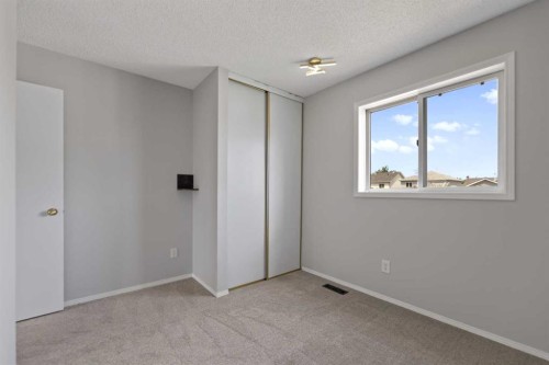 42 River Rock Road Se, Calgary, AB - Indoor Photo Showing Other Room