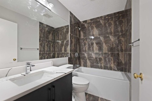 42 River Rock Road Se, Calgary, AB - Indoor Photo Showing Bathroom
