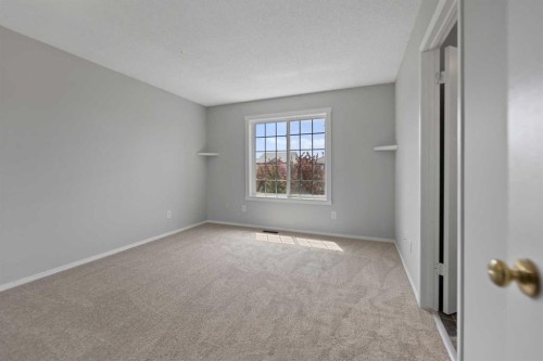 42 River Rock Road Se, Calgary, AB - Indoor Photo Showing Other Room