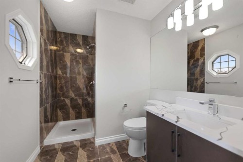 42 River Rock Road Se, Calgary, AB - Indoor Photo Showing Bathroom