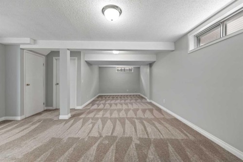 42 River Rock Road Se, Calgary, AB - Indoor Photo Showing Other Room