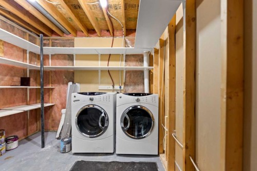 42 River Rock Road Se, Calgary, AB - Indoor Photo Showing Laundry Room