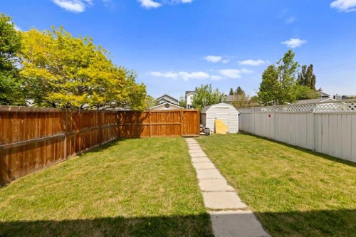 42 River Rock Road Se, Calgary, AB - Outdoor With Backyard