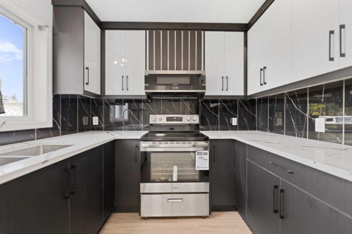 42 River Rock Road Se, Calgary, AB - Indoor Photo Showing Kitchen