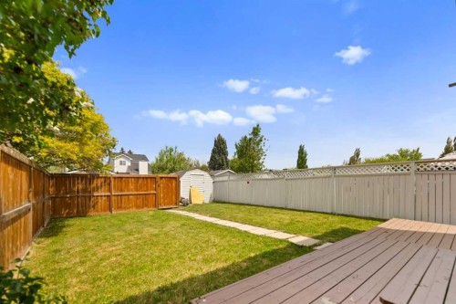 42 River Rock Road Se, Calgary, AB - Outdoor With Backyard