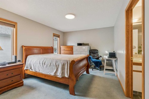 10 Bow Ridge Lane, Cochrane, AB - Indoor Photo Showing Bedroom