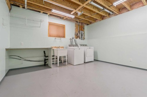 10 Bow Ridge Lane, Cochrane, AB - Indoor Photo Showing Laundry Room