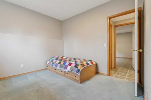 10 Bow Ridge Lane, Cochrane, AB - Indoor Photo Showing Bedroom