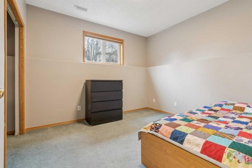10 Bow Ridge Lane, Cochrane, AB - Indoor Photo Showing Bedroom