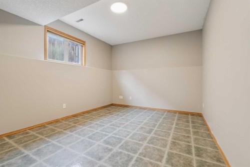 10 Bow Ridge Lane, Cochrane, AB - Indoor Photo Showing Other Room