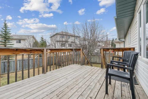 10 Bow Ridge Lane, Cochrane, AB - Outdoor With Deck Patio Veranda With Exterior
