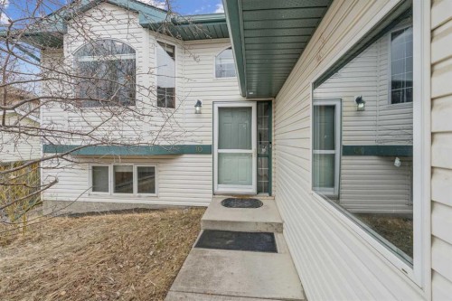 10 Bow Ridge Lane, Cochrane, AB - Outdoor With Exterior