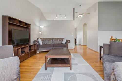 10 Bow Ridge Lane, Cochrane, AB - Indoor Photo Showing Living Room