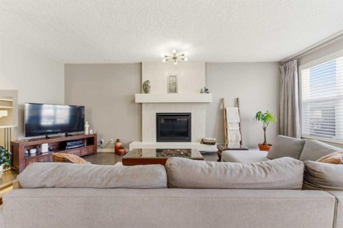 172 Auburn Bay Avenue Se, Calgary, AB - Indoor Photo Showing Living Room With Fireplace