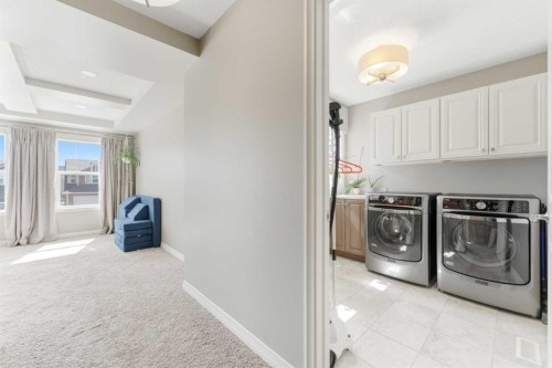 172 Auburn Bay Avenue Se, Calgary, AB - Indoor Photo Showing Laundry Room