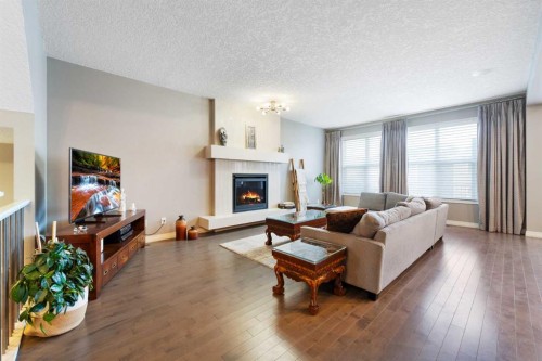 172 Auburn Bay Avenue Se, Calgary, AB - Indoor Photo Showing Living Room With Fireplace