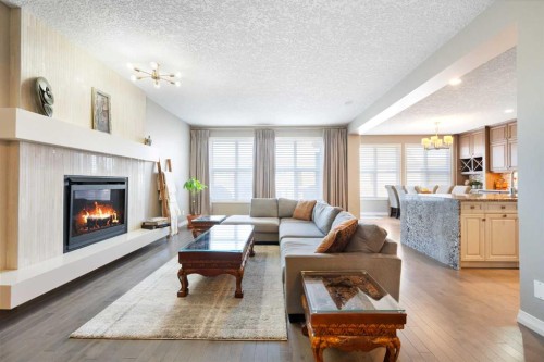 172 Auburn Bay Avenue Se, Calgary, AB - Indoor Photo Showing Living Room With Fireplace