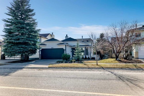 555 Woodbine Boulevard Sw, Calgary, AB - Outdoor With Facade