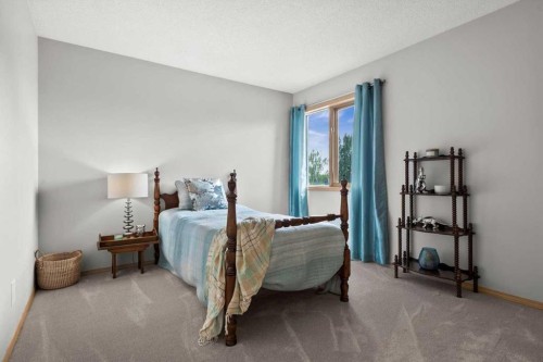 75 Hawkside Close Nw, Calgary, AB - Indoor Photo Showing Bedroom
