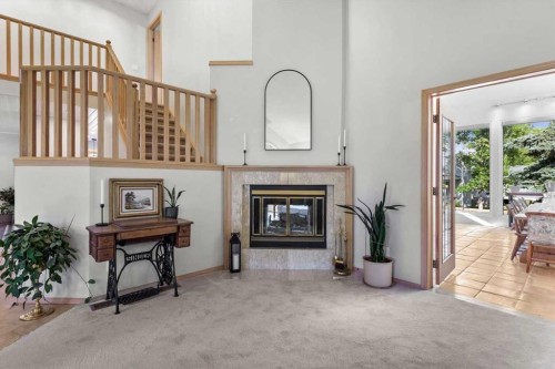 75 Hawkside Close Nw, Calgary, AB - Indoor With Fireplace